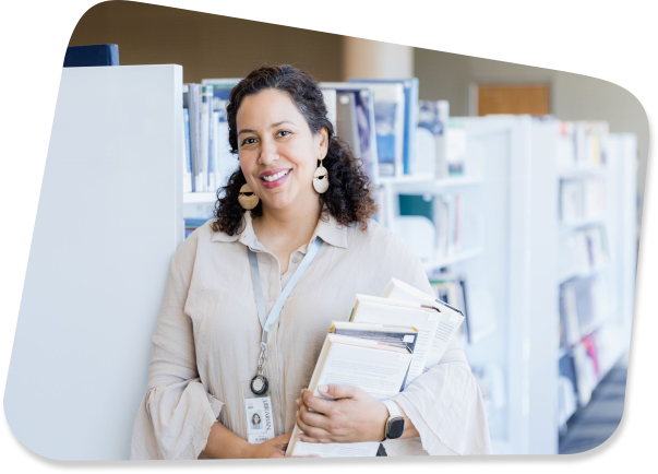 smiling teacher in library