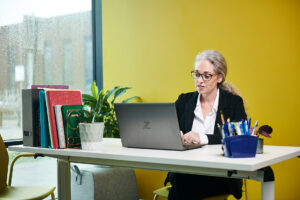 teacher using a laptop